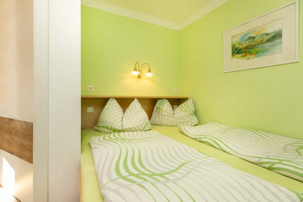 Doppelbett des Schlafzimmers vom Appartement 1 in Flachau
