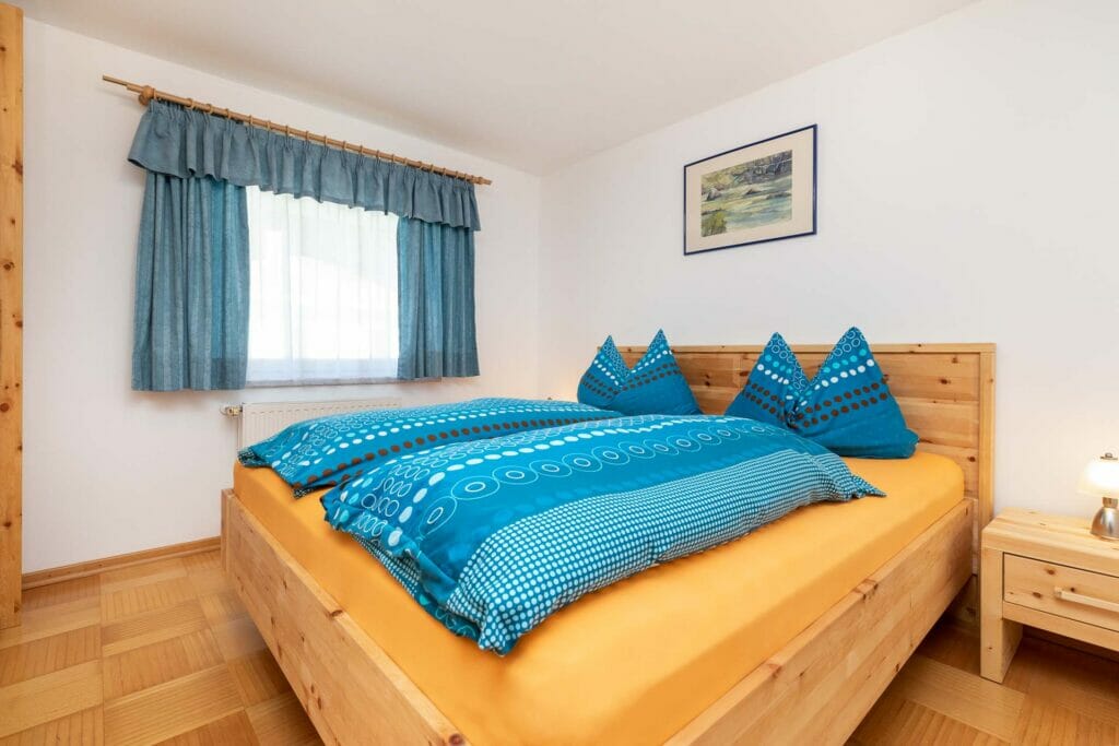 Doppelbett im Schlafzimmer des Appartement 2a in Flachau Winkl